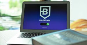 AI DeFi: Laptop with blockchain application interface connecting. Ideal for tech and crypto themes